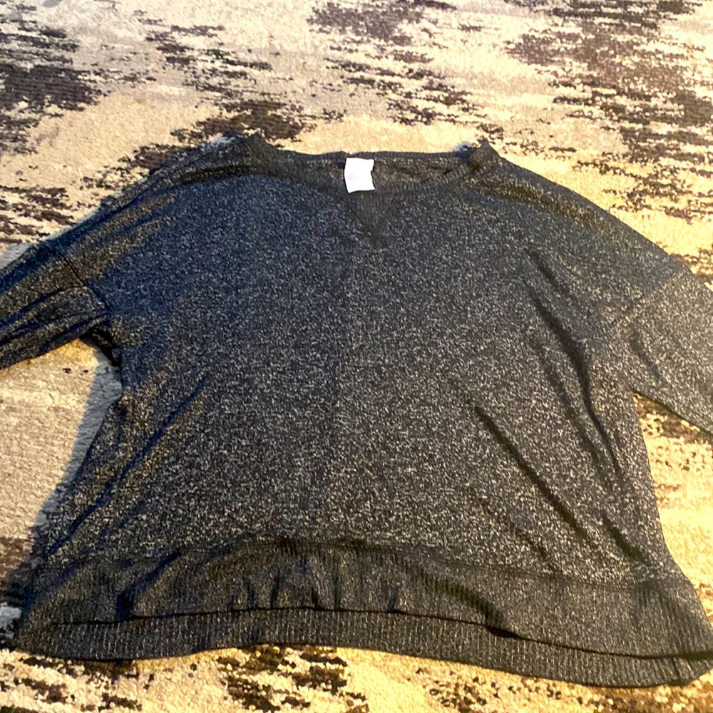 Black size medium long sleeved shirt.